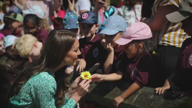 Kate bonds with boy over football on children’s centre visit