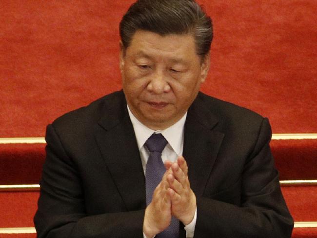 Chinese President Xi Jinping attends the closing session of the Chinese People's Political Consultative Conference (CPPCC) at the Great Hall of the People in Beijing Wednesday, May 27, 2020. (AP Photo/Andy Wong)