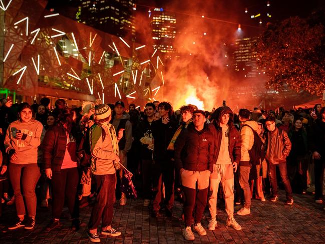 Fans watch on during a Matildas match at a live site in Melbourne. Picture: Darrian Traynor/Getty Images.