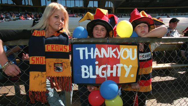 Crows fan Tina Zampaglione with daughter Marie and Michelle Male showed their support following Blight’s exit from the club.