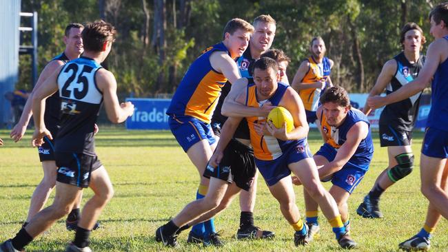 29/03/2023 - ATW Eagles coach Shaun Stone has hailed Michael Blair (centre) as one of the best players in the Wide Bay AFL senior competition. Picture: Samantha Hayhoe