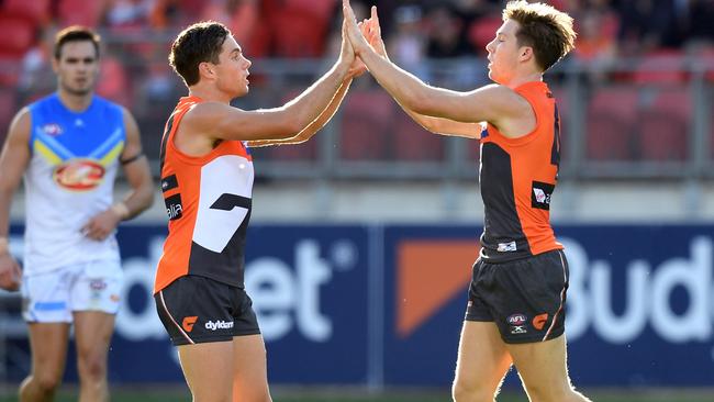 Josh Kelly celebrates a goal with GWS teammate Toby Greene. Picture: AAP Images