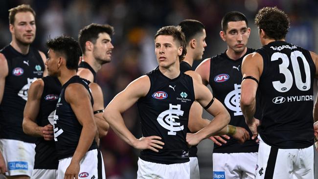 BRISBANE, AUSTRALIA – SEPTEMBER 23: Blues players look dejected after losing the AFL Second Preliminary Final match between Brisbane Lions and Carlton Blues at The Gabba, on September 23, 2023, in Brisbane, Australia. (Photo by Quinn Rooney/Getty Images)