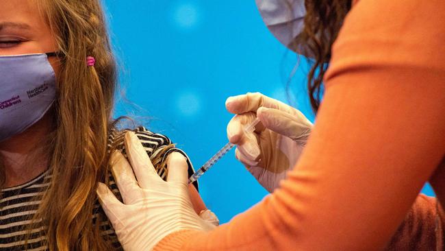 A young child receives a Covid-19 Vaccine in the USA. Picture: AFP.