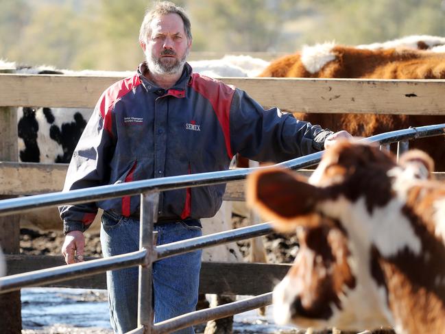 Brett Hayter and his wife Melinda are reluctantly considering selling their farm as they struggle to make ends meet. Picture: Tim Hunter.