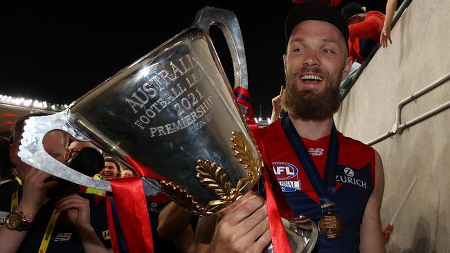 Max Gawn heads into the rooms with the premiership cup. Picture: Michael Klein