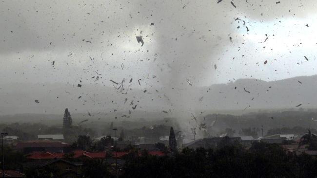 A roof disintegrates as it is hit by the tornado that struck Lennox Head. Picture supplied by Ross Tuckerman.