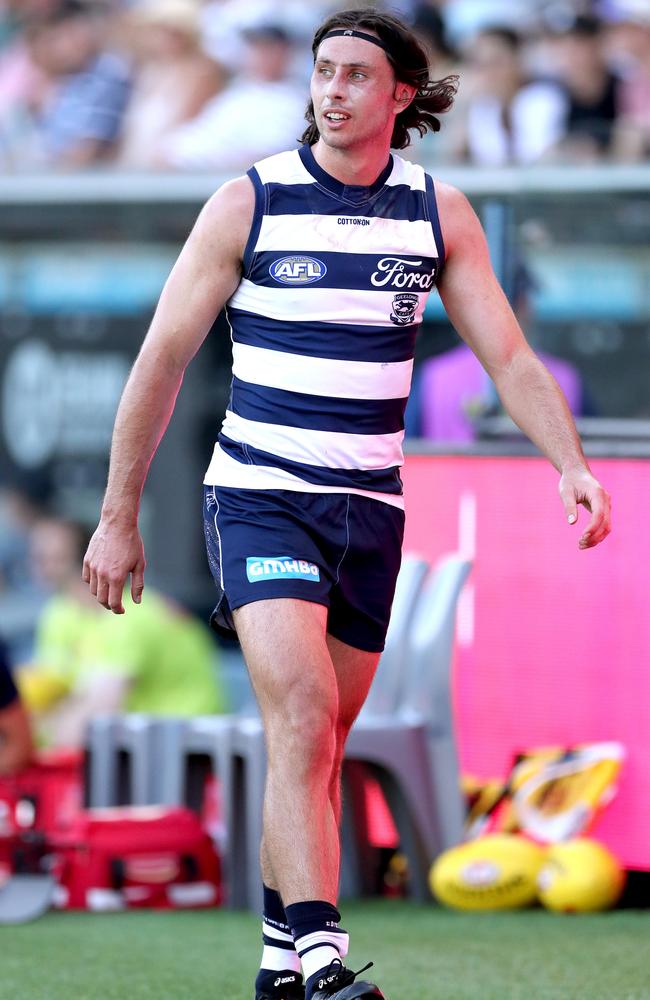 Jack Henry leaves the field in discomfort during the Hawthorn game Picture: Kelly Defina/Getty Images