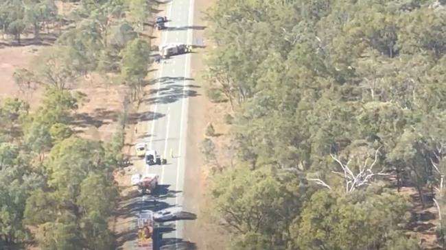 Emergency services on scene of the Woolein crash. PHOTO: RACQ CapRescue.