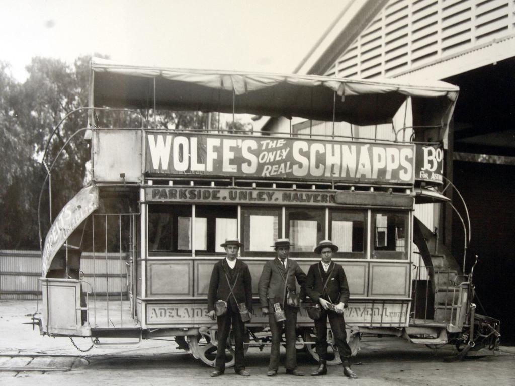 Conductors with a horse-drawn tram.