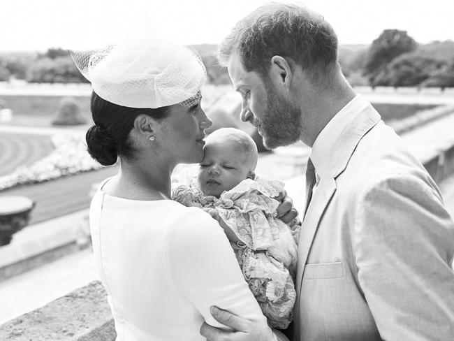 Meghan and Harry cradling little Archie at his christening. Photo credit: Chris Allerton