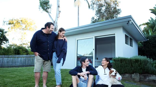 Triple M breakfast host Gus Worland, at home with his three kids Jack, Ella and Abbey, in Elanora Heights. Picture: Tim Hunter.