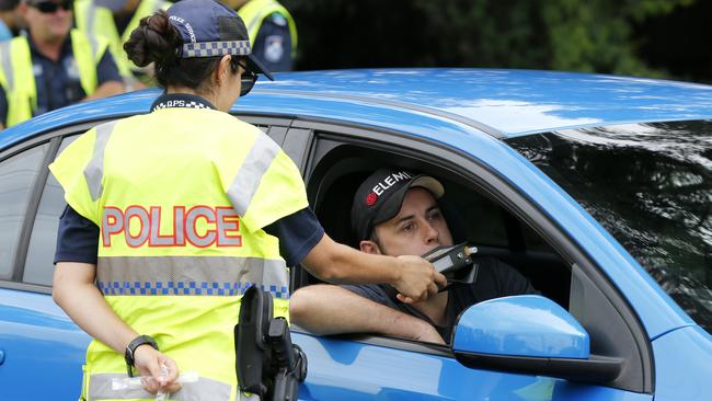 Breath testing ... More Aussies are being nabbed for drink-driving during the day. Picture: Jerad William