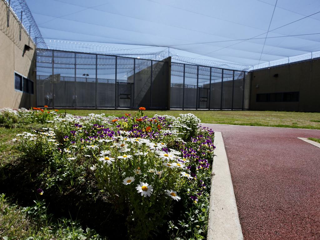 Flower bed and running track in the yard at Supermax prison where access to the outside is a privilege earned by good behaviour.