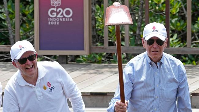 Anthony Albanese and US President Joe Biden at a tree-planting ceremony in Bali on Wednesday. Picture: AFP