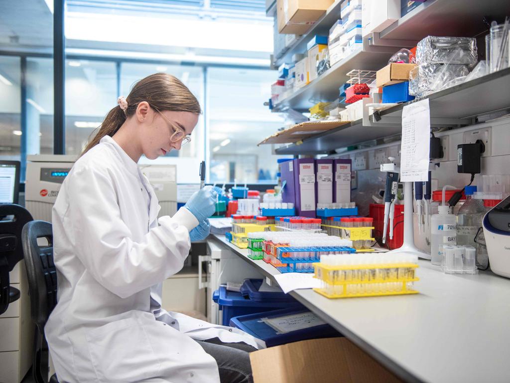 A technician working on the University's COVID-19 candidate vaccine. Picture: AFP