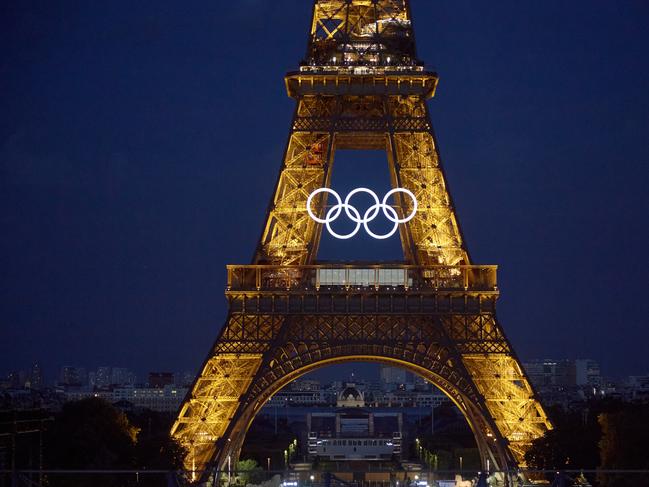 PARIS, FRANCE - JUNE 28: The Olympic rings are seen on the Eiffel Tower on June 28, 2024 in Paris, France. The 2024 Summer Olympic Games begin on July 26. (Photo by Pierre Crom/Getty Images)