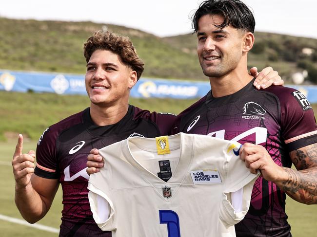 THOUSAND OAKS, CALIFORNIA - FEBRUARY 24: Reece Walsh and Jesse Arthars pose for a photo with a Los Angeles Rams jersey during a Brisbane Broncos NRL training session at California Lutheran University on February 24, 2024 in Thousand Oaks, California. (Photo by Michael Owens/Getty Images)