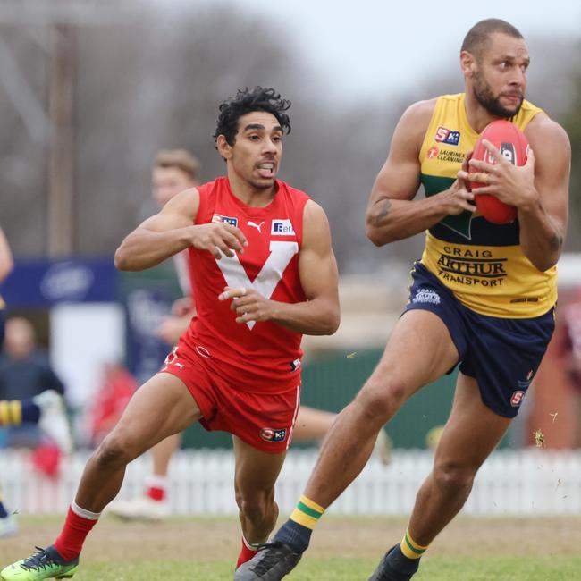 Wodonga Raiders recruit Cameron Ellis-Yolmen, right, playing for Woodville West Torrens last year. Picture: SANFL Image/David Mariuz