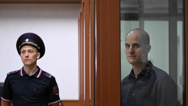 Evan Gershkovich inside a glass defendants' cage prior to a hearing in June. Picture: AFP