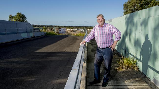 State Member for Coomera, Michael Crandon, is calling for the Government to allow the use of the existing road bridge over the Gold Coast rail line, currently on private land, between Old Pacific Highway and Kosciuszko Circuit. Picture: Jerad Williams