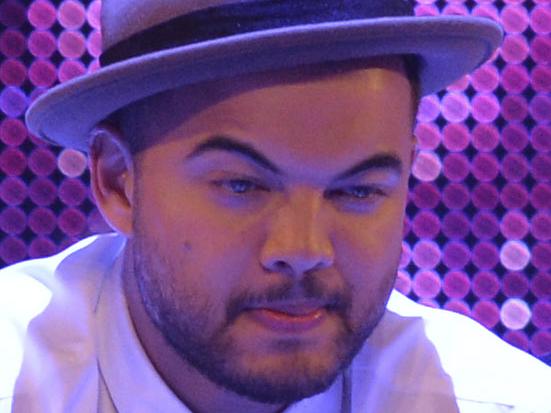 Guy Sebastian representing Australia watches the incoming results during the final of the Eurovision Song Contest in Austria's capital Vienna, Saturday, May 23, 2015. (AP Photo/Kerstin Joensson)