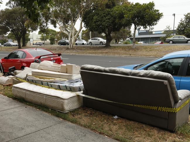 Large piles of illegally dumped rubbish including mattresses, couches, furniture on the nature strip, Nepean Highway, Frankston. Picture: Valeriu Campan