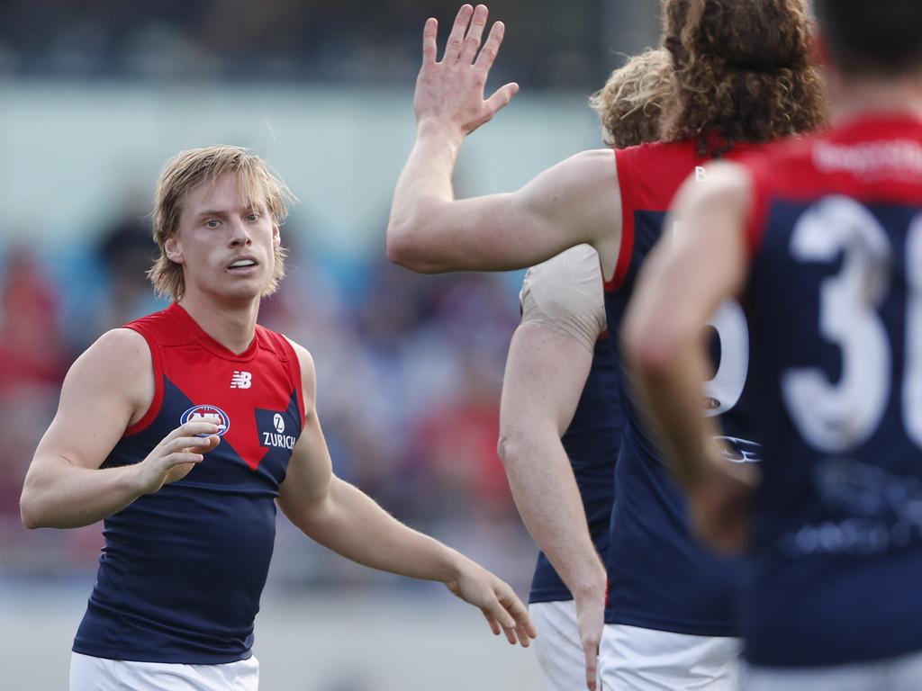 Charlie Spargo of the Demons celebrates a goal.