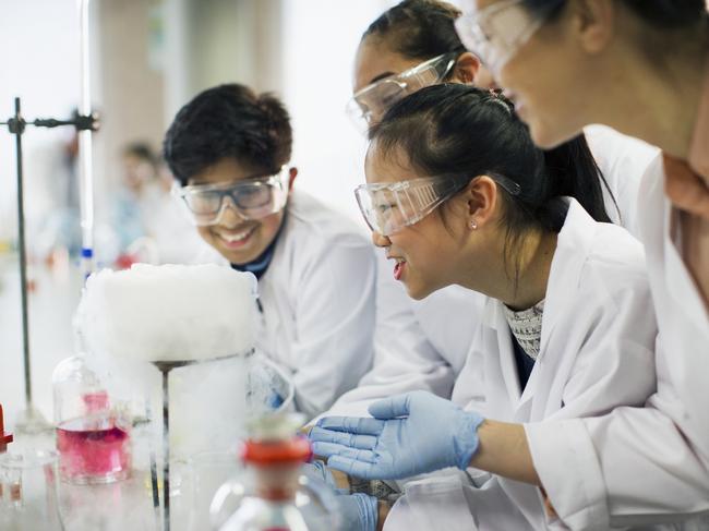 File image: Curious students watching chemical reaction, conducting scientific experiment in laboratory classroom. HSC Chemistry is one of the most mathematically challenging courses outside of the maths subjects.