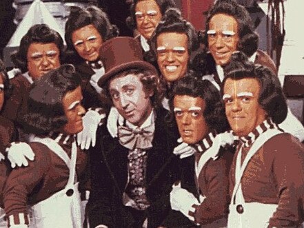 Gene Wilder as Willy Wonka and the Oompa Loompas from film 'Charlie and The Chocolate Factory'.