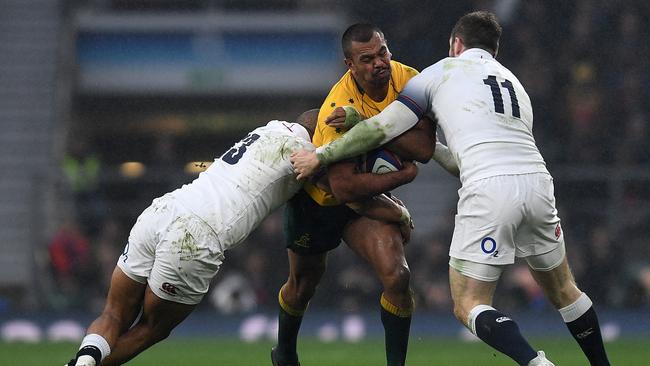 Kurtley Beale runs into a defensive wall at Twickenham.