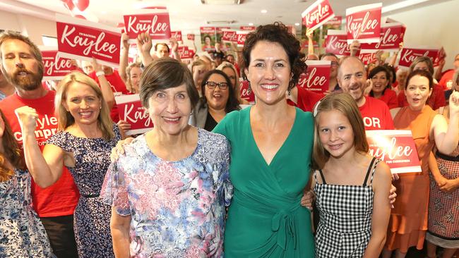 Labor’s Currumbin candidate Kaylee Campradt (centre) with her mum Mavis Campradt and daughter Indie Campradt, 13. Pictured behind Mavis Campradt is Minister for Tourism Kate Jones. Picture: Mike Batterham