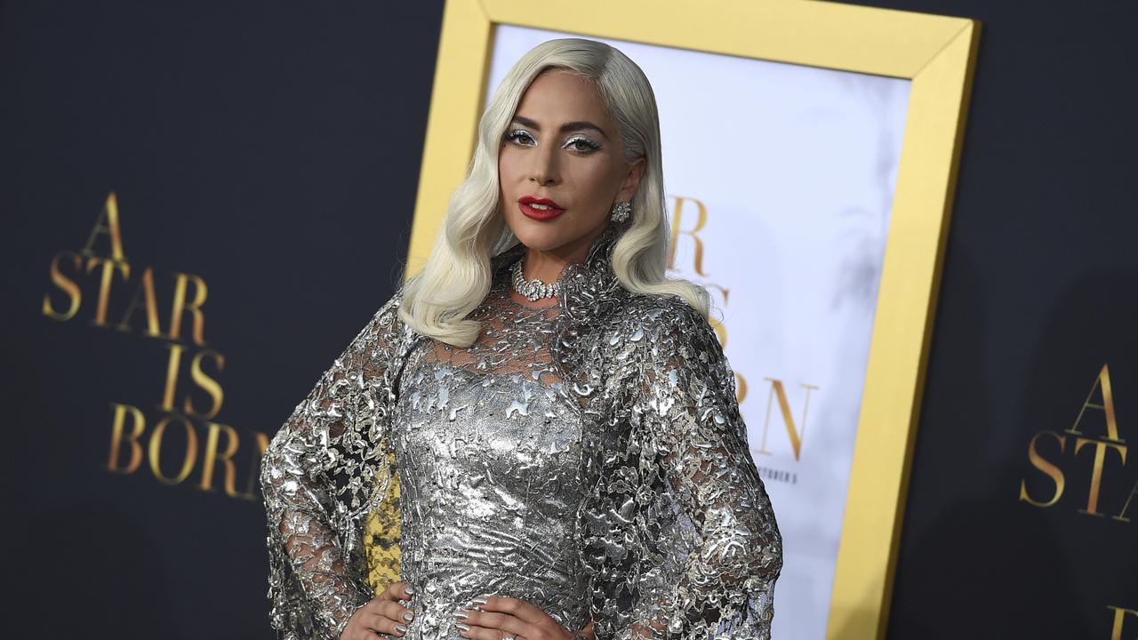 FILE - In this Sept. 24, 2018 file photo, Lady Gaga arrives at the Los Angeles premiere of "A Star Is Born," at the Shrine Auditorium. Lady Gaga is nominated for several Grammy Awards including one for record of the year and song of the year. The Grammy Awards will be held on Sunday. (Photo by Jordan Strauss/Invision/AP, File)