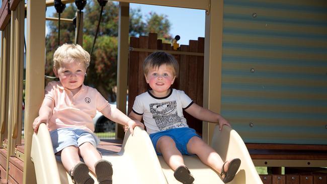 George Outram (left), 2, and Ari Boorer (right), 2 enjoying the new slide. Supplied: City of Newcastle