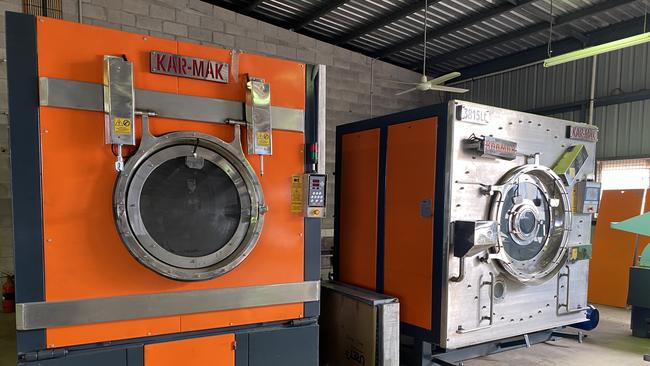 A giant dryer and washing machine for garment manufacture.