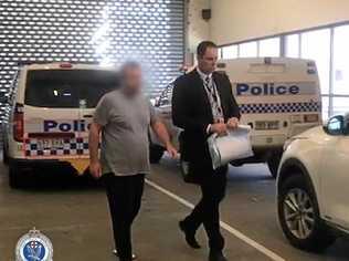 The man being escorted to Tweed Heads Police Station. Picture: NSW Police