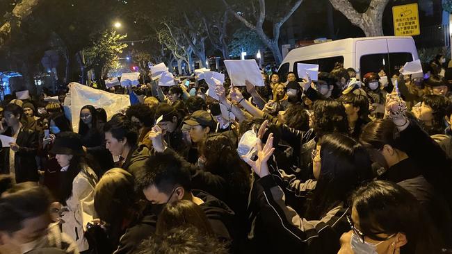 In Shanghai, a crowd of protesters call for China’s leader Xi Jinping to step down, a rare act of political defiance reflecting growing public frustration with his “zero Covid” demands.