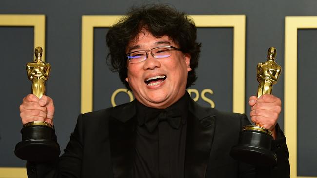 South Korean director Bong Joon-ho poses in the press room with the Oscars for the film Parasite during the 92nd Oscars in February this year. Picture: Frederic J Brown/AFP