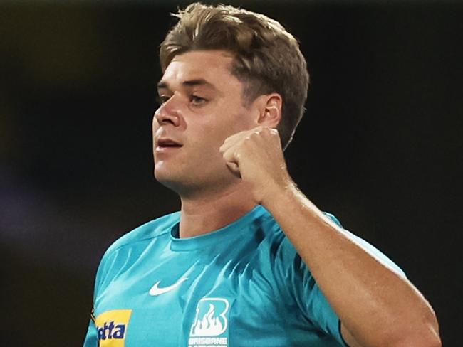 SYDNEY, AUSTRALIA - FEBRUARY 02: Spencer Johnson of the Heat celebrates taking the wicket of Dan Christian of the Sixers during the Men's Big Bash League match between the Sydney Sixers and the Brisbane Heat at Sydney Cricket Ground, on February 02, 2023, in Sydney, Australia. (Photo by Matt King/Getty Images)