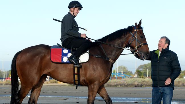 Denis Pagan with Johnny Get Angry and jockey Lachlan King at Altona Beach. Picture: Andrew Henshaw
