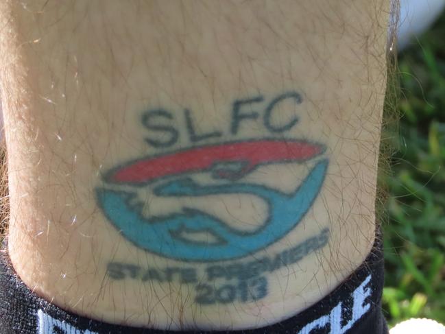 South Launceston co-captain Jay Blackberry has a permanent reminder of their 2013 State League flag. Picture: Jon Tuxworth