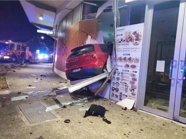 Social media users have shared images of a car crashed into a shopping centre at Newmarket in Brisbane's north.