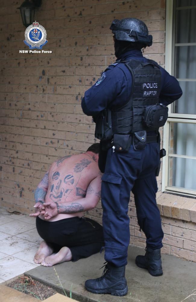 Cuffed.... Raptor officers arrests man at scene. Source: NSW Police media
