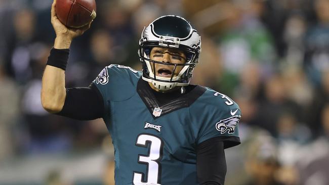 Mark Sanchez #3 of the Philadelphia Eagles pump fakes.