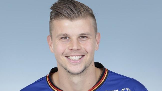 Bundaberg's Mitch Langerak poses with his Nagoya Grampus jersey.