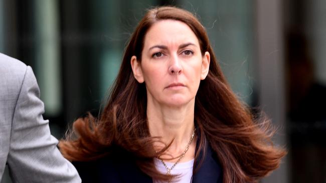 ANZ’s Kate Gibson leaves the royal commission hearing. Pic: AAP