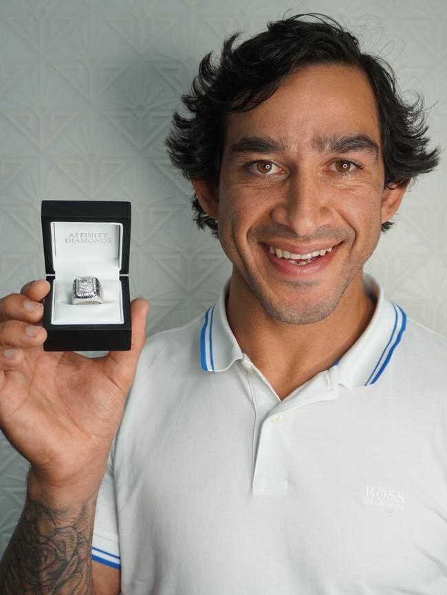 Johnathan Thurston shows off the NRL premiership ring.