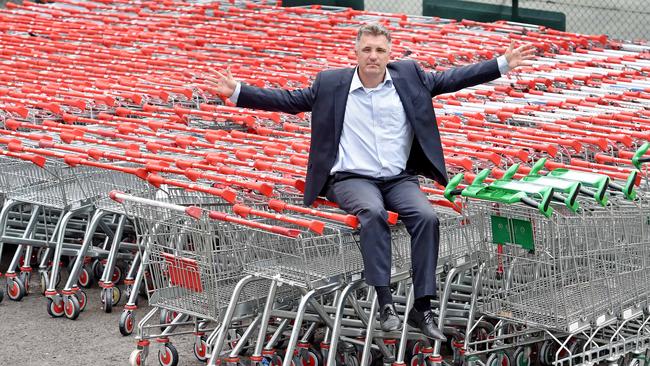 Hornsby councillor Nathan Tilbury with over 400 shopping trolleys impounded at Community Recycling Centre at Thornleigh. Pic: AAP Image/Troy Snook