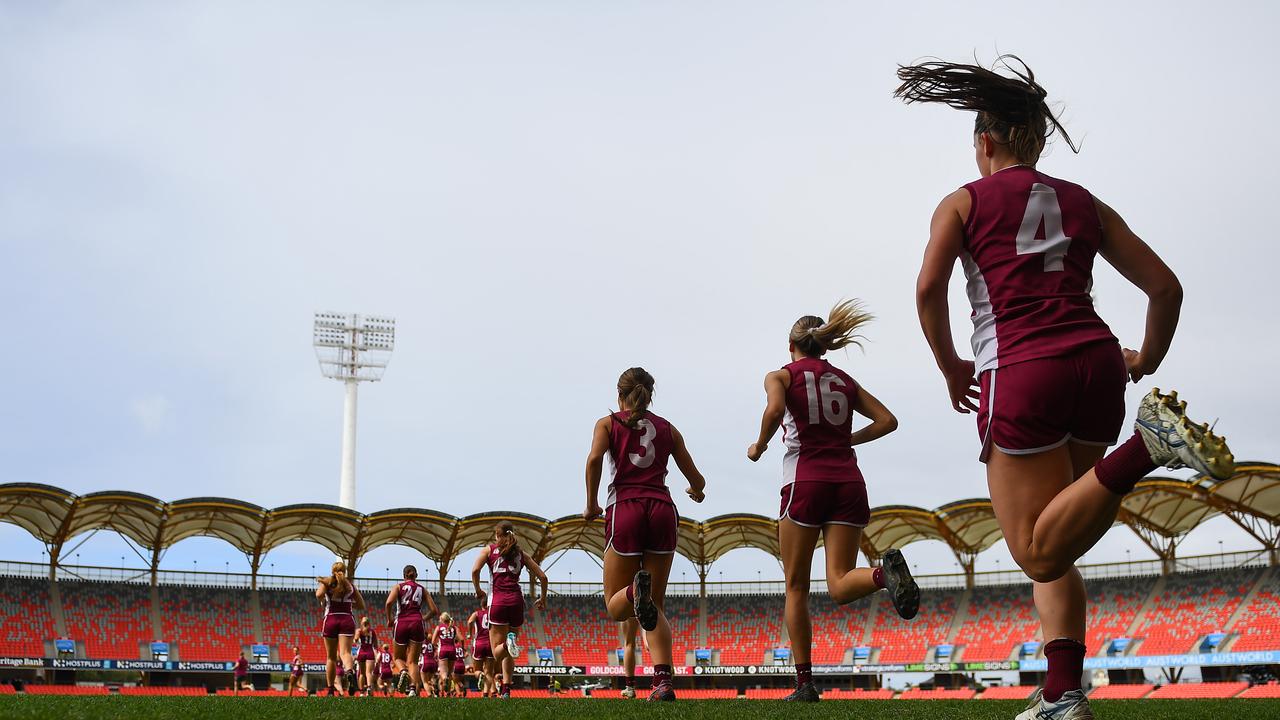 Queensland take to the field last season. (Photo by Albert Perez/AFL Photos)