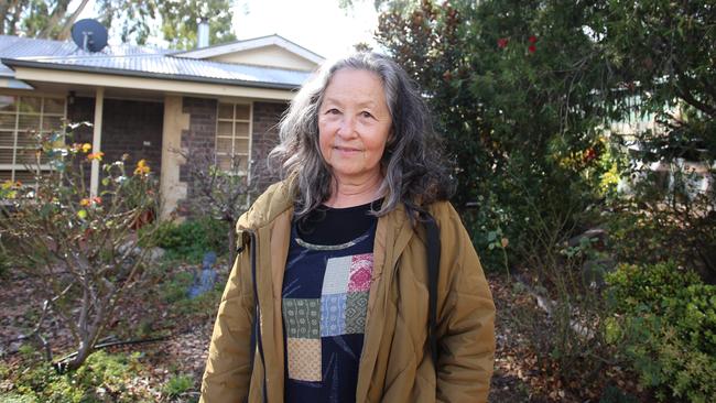 Meme Thorne, an Extinction Rebellion activist who also appears as an actor in an Ampol ad, pictured at home on Friday. Picture: Brett Hartwig